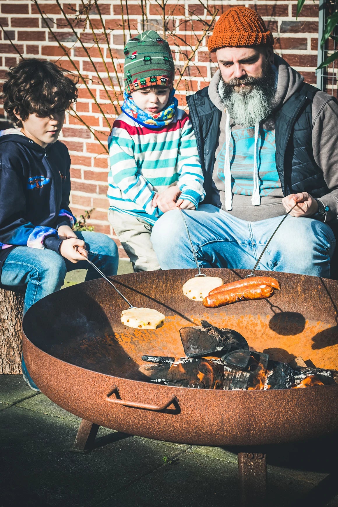 Der Windmühlen-Feuerstellenstock aus Gusseisen