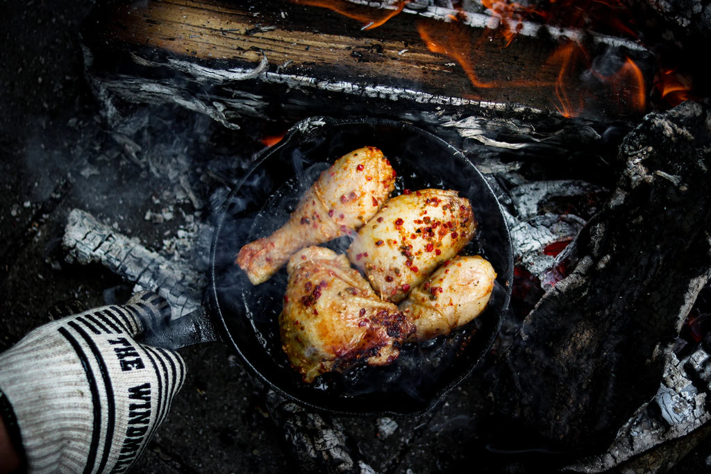 Der hitzebeständige Gusseisenhandschuh der Windmühle